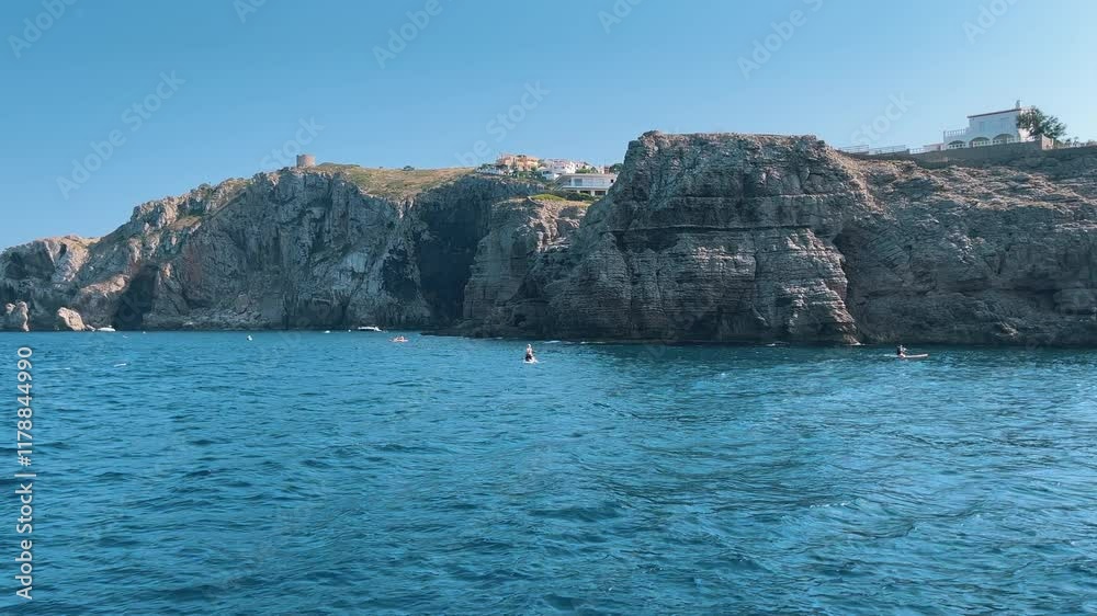 speeding past the gorgeous rocky coast along a Mediterranean island paradise. speeding past the gorgeous rocky coast along a Mediterranean island paradise.