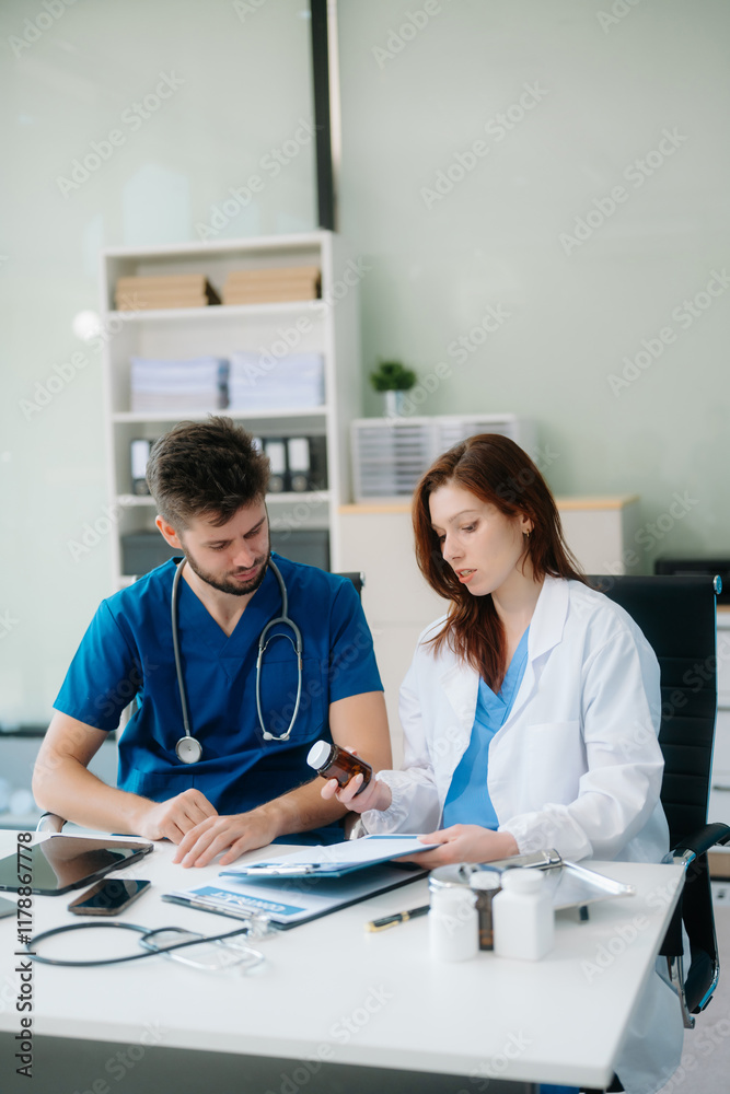 Doctors analyzing results or diagnosis of patient in clinic. Teamwork, medical and healthcare workers Doctors analyzing results or diagnosis of patient in clinic. Teamwork, medical and healthcare workers