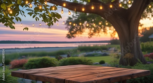 Empty Wood table top with decorative outdoor string lights hanging on trees in the revier nature at sunset time,	
 photo