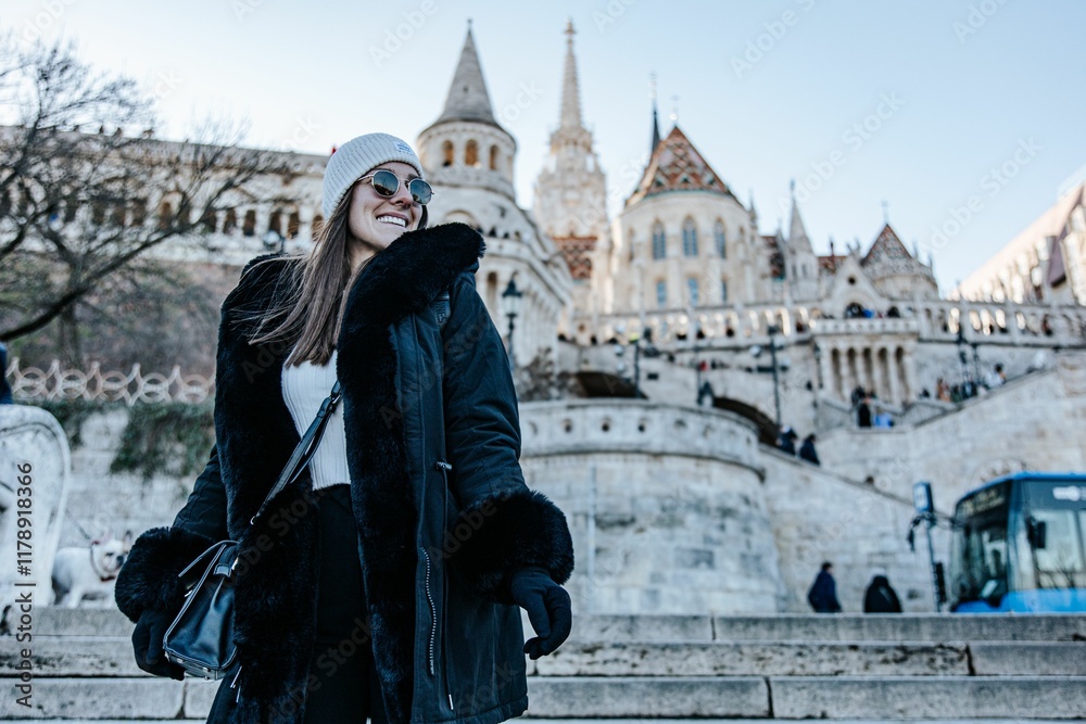 Obraz premium Woman in Winter Attire at Fisherman's Bastion