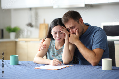 Sar interracial couple reading paper contract photo