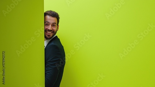 Cheerful businessman with vibrant green background photo