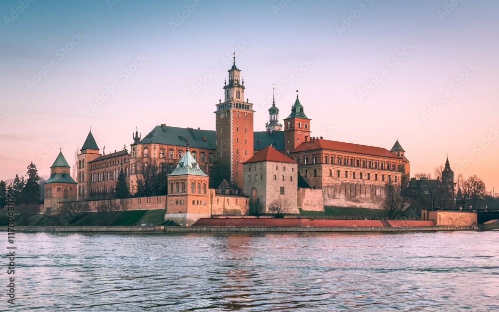 Fototapeta premium Krakow's Wawel Castle, Poland Majestic castle on river at sunset.