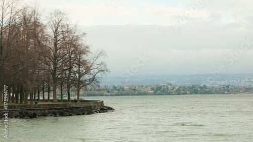 Establishing shot of Morges quay with lake Geneva in Canton of Vaud Switzerland