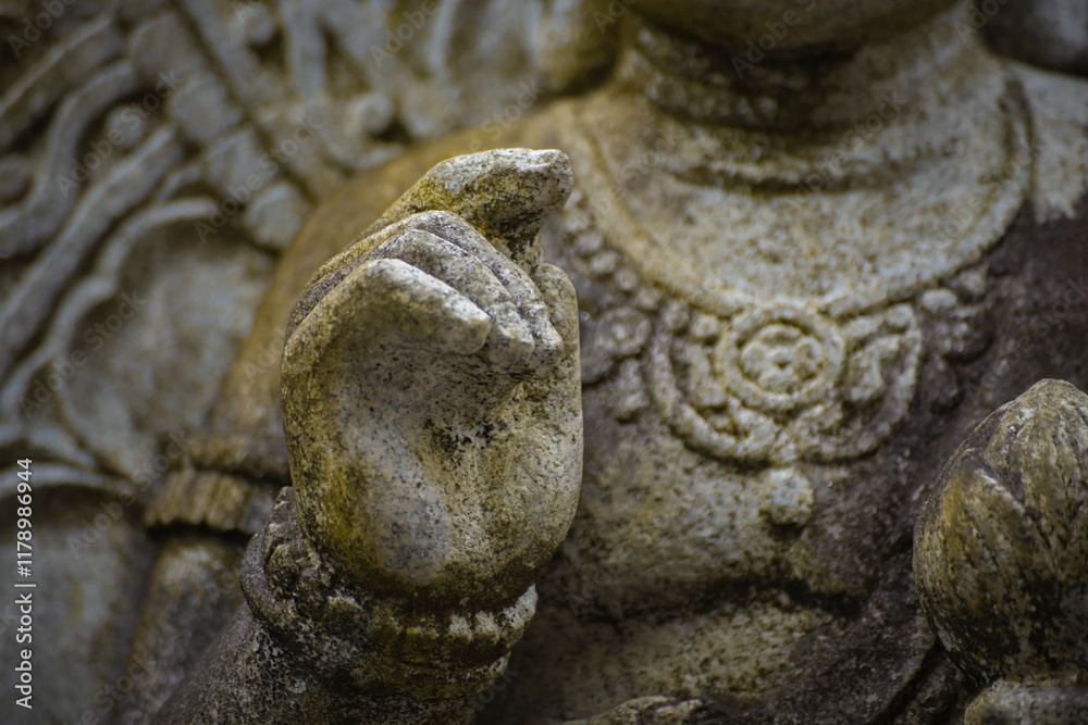 A religious stone statue of Mahasthamaprapta at Japanese buddhism temple A religious stone statue of Mahasthamaprapta at Japanese buddhism temple