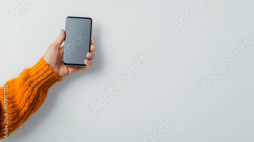 A hand with a smartphone mockup photo