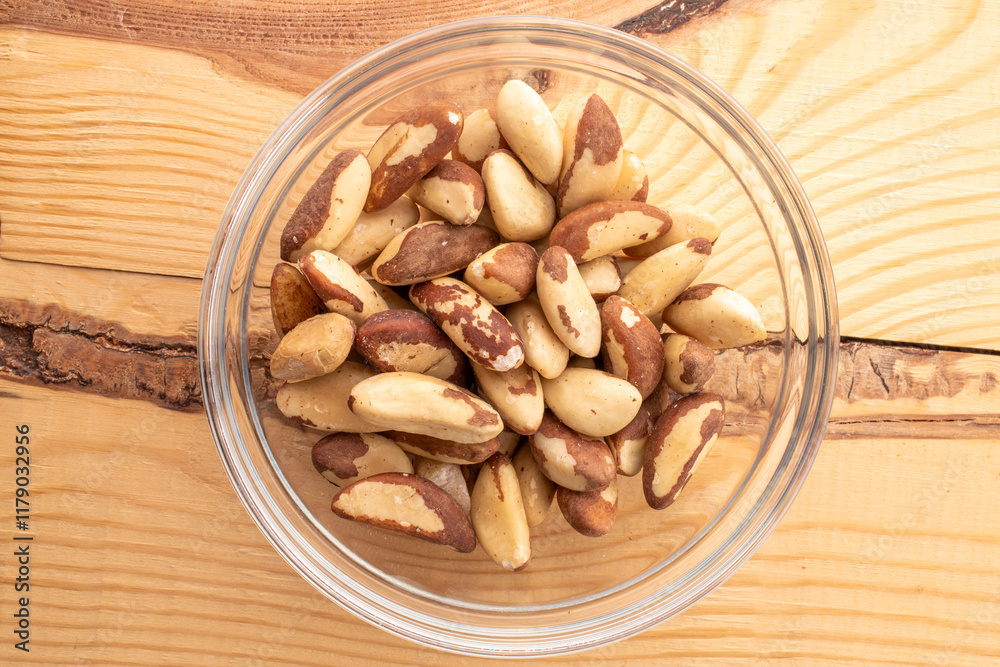 Brazil nut with homemade kitchen utensils, macro, isolated on white background and top view. Brazil nut with homemade kitchen utensils, macro, isolated on white background and top view.