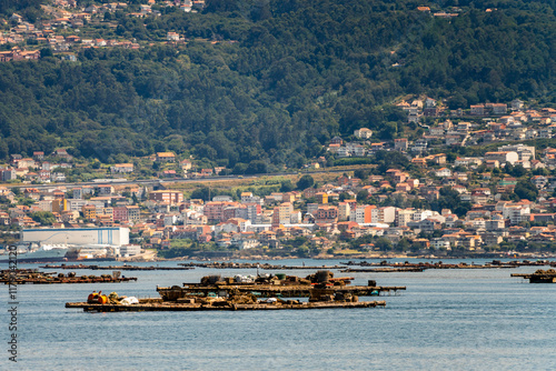 Coast of Marina in Moana with residential houses in the background - Galicia, Spain