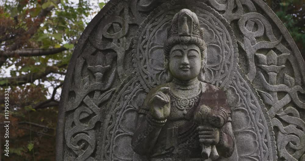 A religious stone statue of Mahasthamaprapta at Japanese buddhism temple A religious stone statue of Mahasthamaprapta at Japanese buddhism temple