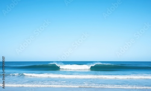 Calm ocean waves under bright sky