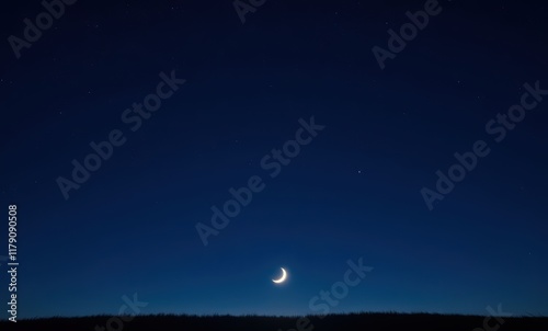 Crescent moon in a dark sky