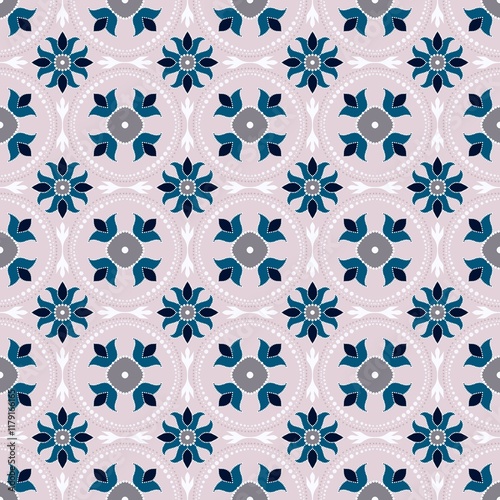 Seamless floral pattern featuring circular motifs and bold colors on a soft background. Floral Pattern With Symmetrical Motifs and Subtle Pink Background