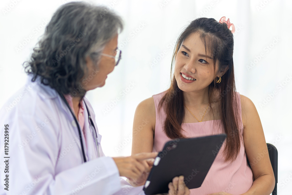 Female Doctor use digital tablet for Consulting with Pregnant Woman Female Doctor use digital tablet for Consulting with Pregnant Woman
