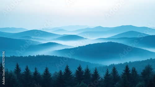 A serene landscape of rolling blue hills and misty forests at dawn.