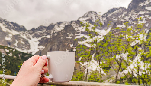 A white cup on the background of high mountains, Tatras, Sea Eye photo