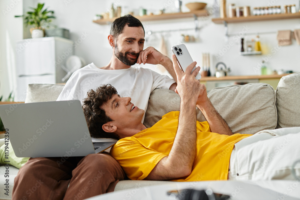 Fototapeta premium Two men enjoying a cozy moment together in their stylish modern apartment