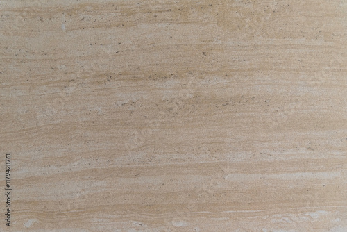 Beige stone surface with horizontal vein patterns and natural texture