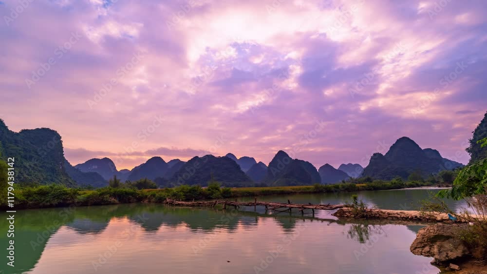 Timelapse wide angle view of landscape with rice field at Phong Nam village in Trung Khanh,Cao Bang province,Northern Vietnam,Timelapse sunset sky over river,Clouds flowing over mountains