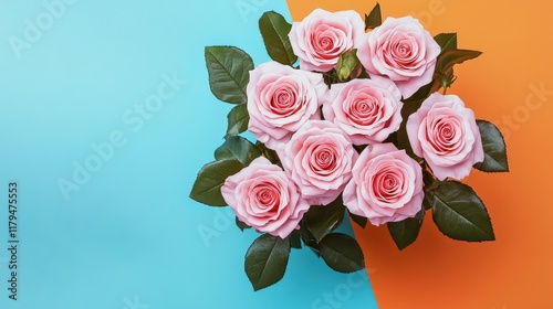 A stunning bouquet of vibrant roses in shades of red, pink, and white fills the air with their sweet fragrance. 