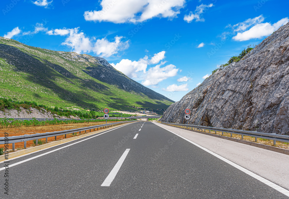 Countryside highway in a beautiful mountainous area.