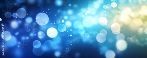 Abstract blue and yellow bokeh lights background creating festive atmosphere