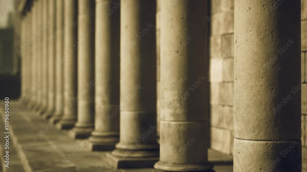 Tall stone columns line a quiet pathway, showcasing detailed craftsmanship and providing a sense of history in the urban environment. Soft light enhances the serene atmosphere. Tall stone columns line a quiet pathway, showcasing detailed craftsmanship and providing a sense of history in the urban environment. Soft light enhances the serene atmosphere.