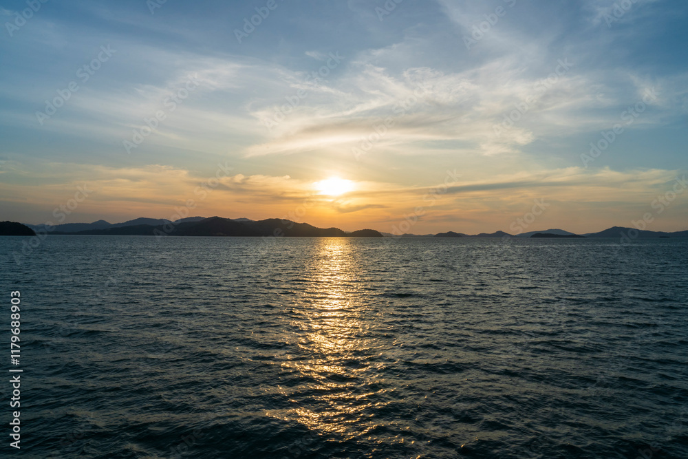 Sunset off the coast of Phuket near Ao Phang Nga National Park Sunset off the coast of Phuket near Ao Phang Nga National Park