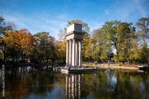 Mausoleum of General Józef Bem - tomb of National hero located in Strzelecki Park. Rectangular sarcophagus based on six Corinthian columns, above ground on island in pond. Tarnów, Poland. photo