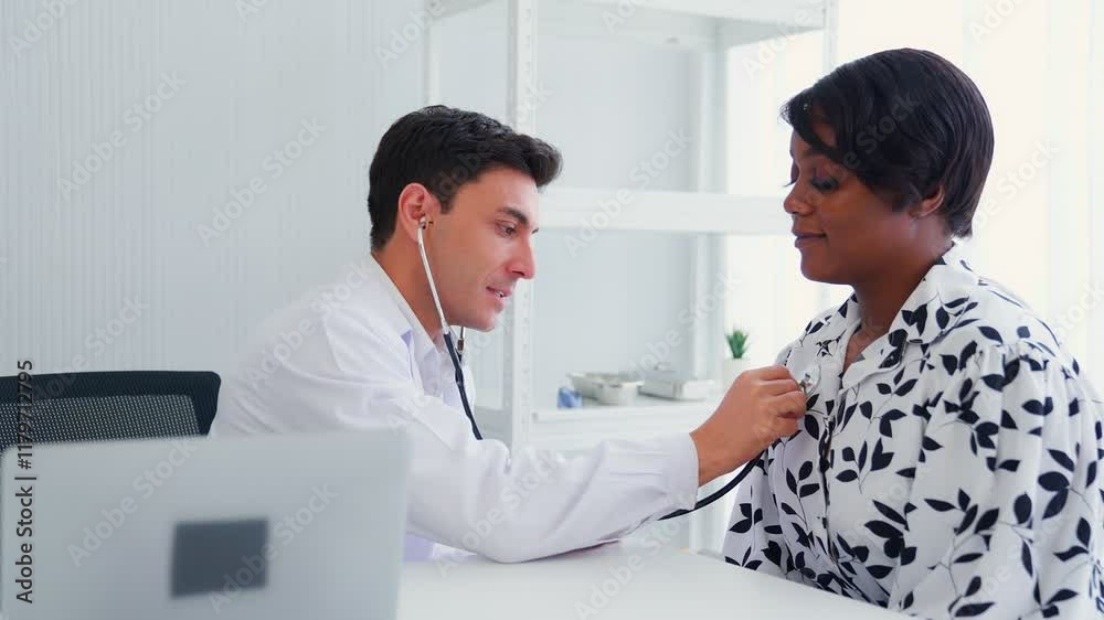 Bad news, African America and doctor in consultation at hospital, cancer diagnosis support and medical advice. health care, results and healthcare expert, encourage reassure patient at medical visit. Bad news, African America and doctor in consultation at hospital, cancer diagnosis support and medical advice. health care, results and healthcare expert, encourage reassure patient at medical visit.