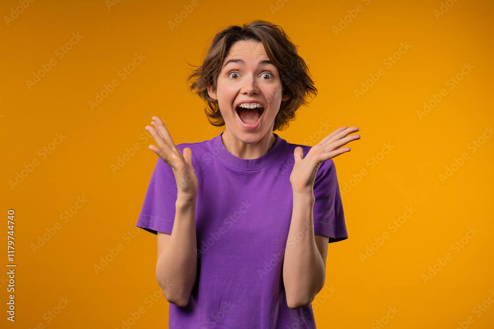 Surprised woman, she expresses WOW, cant believe. Impressed lady trying to get attention. Concept of sales, profitable offer. Excited romantic girl on yellow background Surprised woman, she expresses WOW, cant believe. Impressed lady trying to get attention. Concept of sales, profitable offer. Excited romantic girl on yellow background