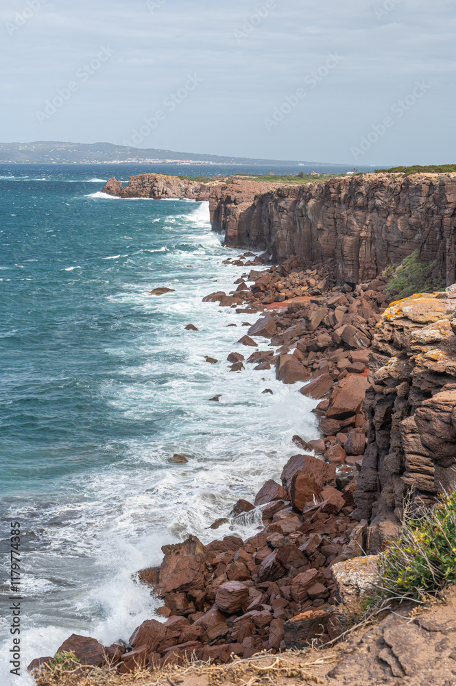 The beautiful high red cliffs of Macorì on the island of Sant'Antioco in Sardinia