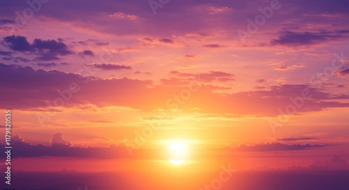 beautiful florescent sunset in the clouds of pink, orange and yellow. bright sun background, dawn or dusk, sunrise, pastel