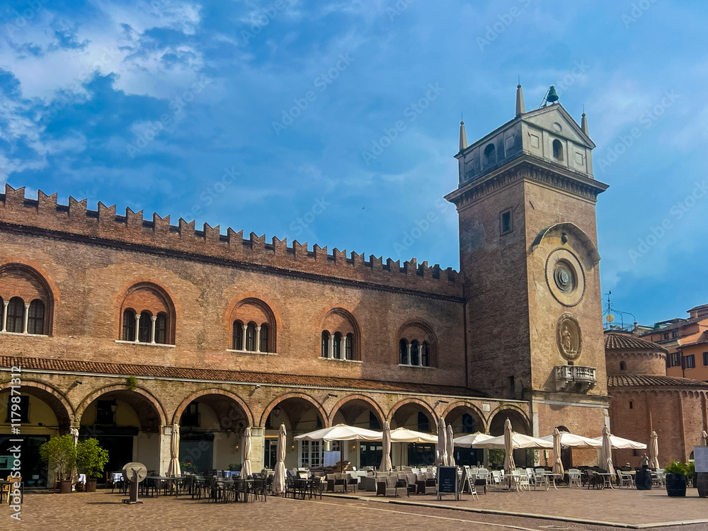 Fototapeta premium Mantova city square with historic architecture, clock tower and outdoor cafes