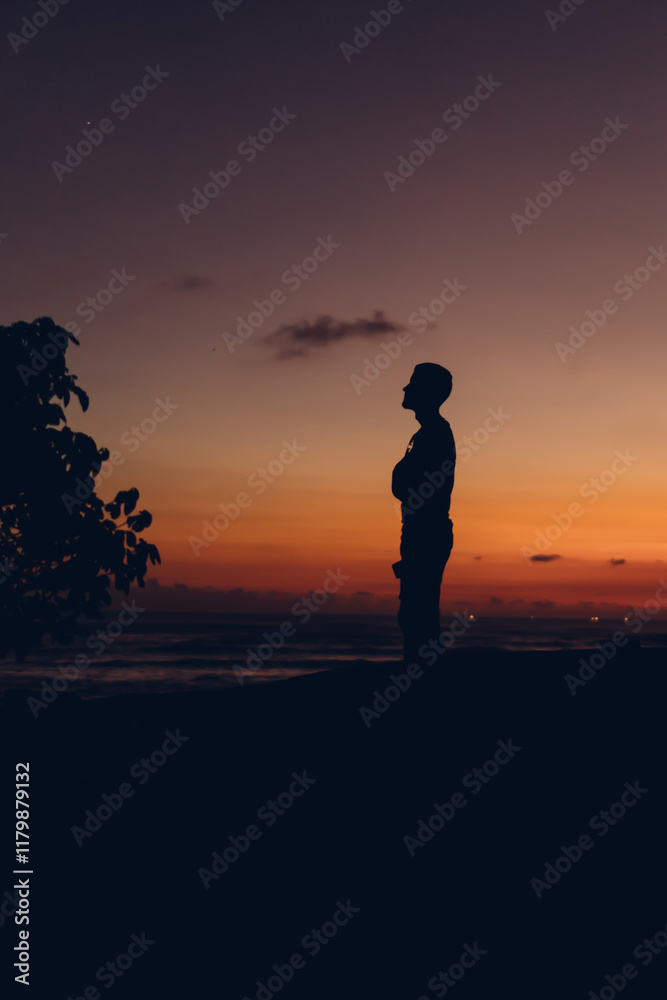 Unrecognizable silhouette of woman in twilight Unrecognizable silhouette of woman in twilight