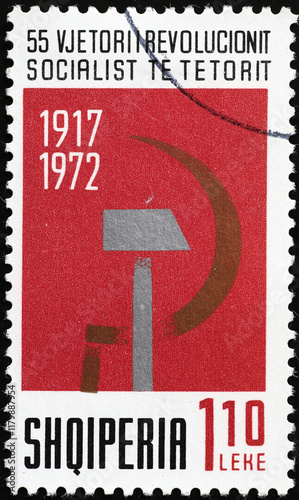 Hammer and sickle on old stamp from Albania