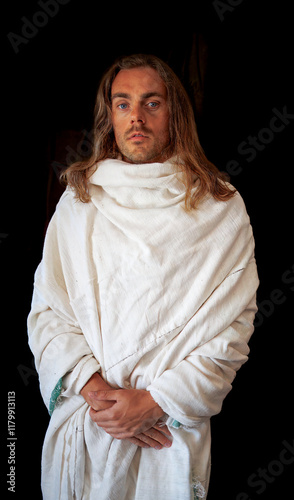 Obraz na płótnie Holy man in a white robe with long hair and beard like Christ w salonie