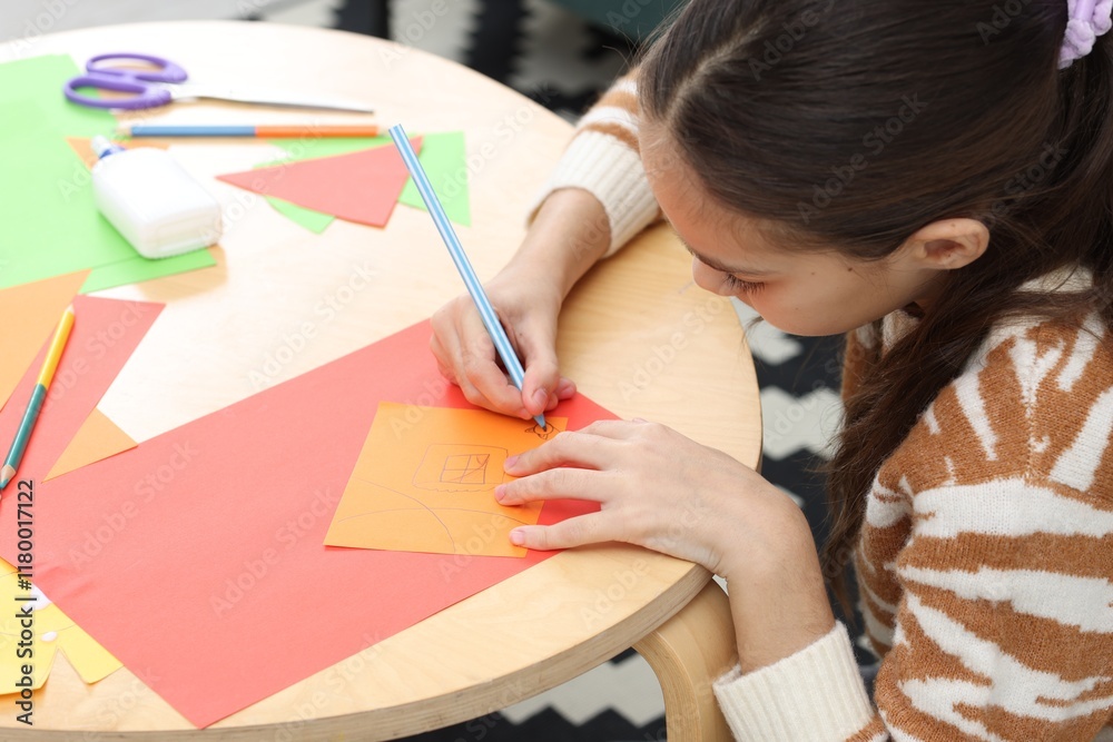 Girl drawing card at table indoors. Art and craft Girl drawing card at table indoors. Art and craft