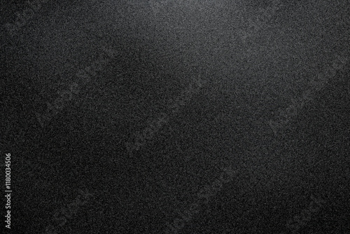 A minimalist dark grainy texture with a subtle gradient, perfect for moody, modern, or abstract design projects.