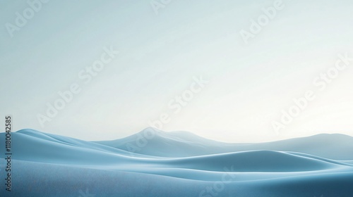 Blue sky with a mountain range in the background. The sky is clear and the mountains are covered in snow