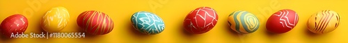 easter banner . a row of easter eggs ornament on yellow background in banner format	
 photo