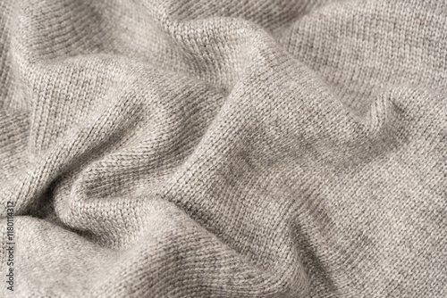 Grey wool sweater texture as a background. photo