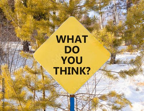 What do you think symbol. Concept words What do you think on beautiful yellow road sign. Beautiful winter forest background. Business and What do you think concept. Copy space.