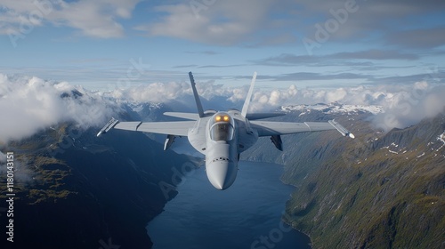 A fighter jet flying over a mountain range photo