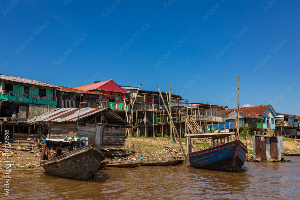Belen neighborhood in Iquitos, Peru. It is presented as a sample of the true jungle culture. Here people travel in boats and live in wooden houses built on the Itaya River. Belen neighborhood in Iquitos, Peru. It is presented as a sample of the true jungle culture. Here people travel in boats and live in wooden houses built on the Itaya River.