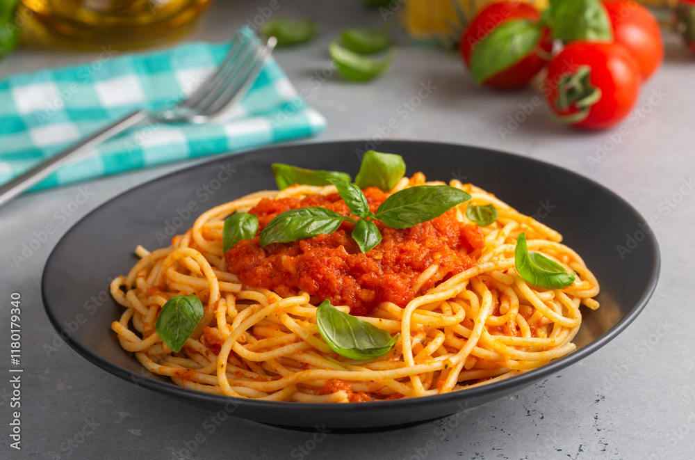 Tasty appetizing classic italian spaghetti pasta with tomato sauce Tasty appetizing classic italian spaghetti pasta with tomato sauce