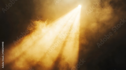Golden spotlight cutting through smoky stage haze