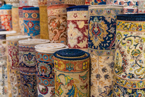 Traditional Turkish carpets are offered for sale at a bazaar