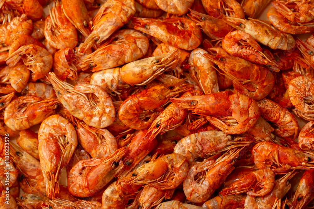 Shrimp close-up in a large pile. Smoked and salted shrimp with spices for a beer snack. Shrimp close-up in a large pile. Smoked and salted shrimp with spices for a beer snack.