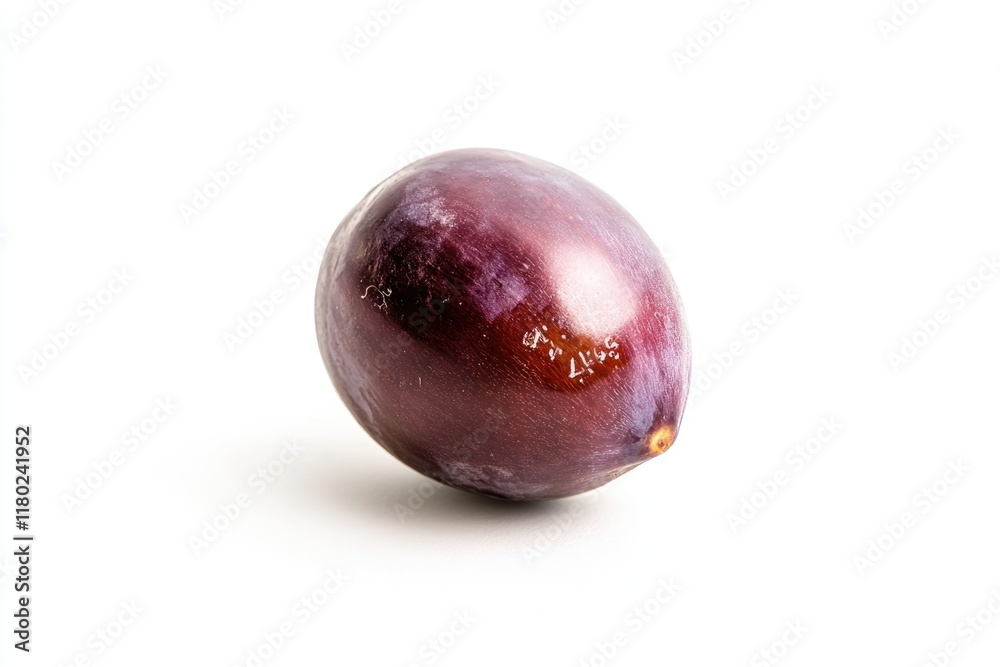 A close-up view of a single plum sitting on a white surface, highlighting its natural color and texture A close-up view of a single plum sitting on a white surface, highlighting its natural color and texture
