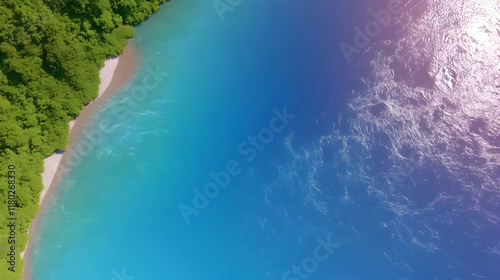 Aerial view of tropical beach, turquoise water, lush green vegetation, sunlight reflecting on ocean; ideal for travel brochures. photo